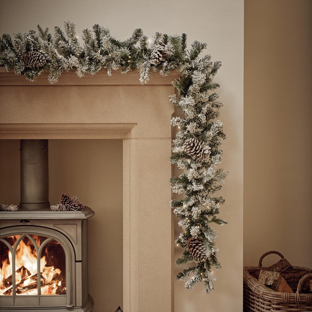 An image of BOSK Snowy Winterfold 6ft x 12" Garland with Warm White LEDs