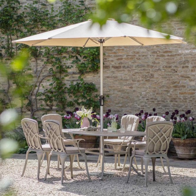 Bramblecrest Milan 184 x 108cm Oval Table with 6 Armchairs, Parasol & Base - Stone